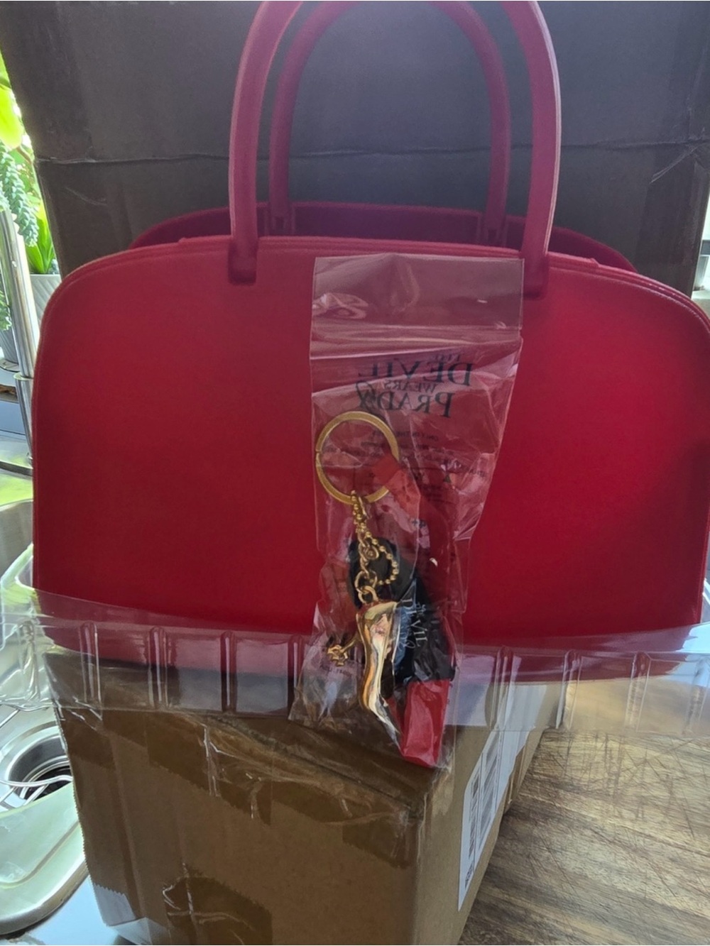 Devil Wears Prada Red Hard plastic purse & heel Charm with Gold-Tone Ring